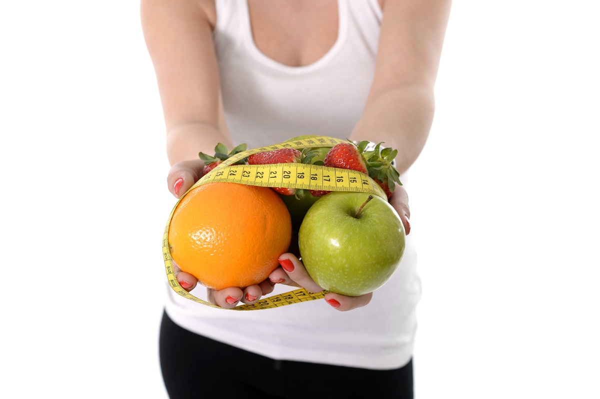 woman hands with fruit