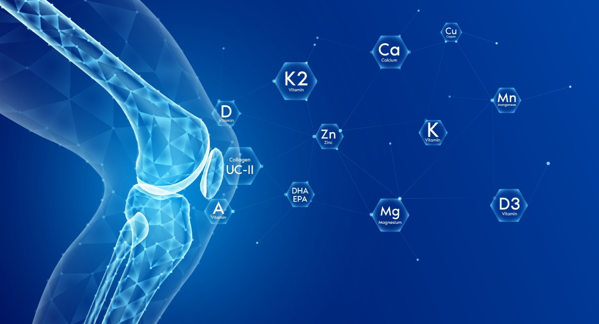 Illustration of a human knee joint with floating hexagons labeled with vitamins and minerals like K2, Ca, Zn, Mg, and D3 on a blue background.